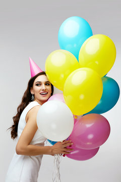 Birthday Girl. Beautiful Woman With Colorful Balloons.