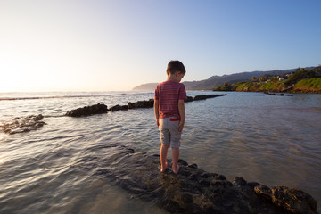 Child Playing on Beach in Oahu Hawaii