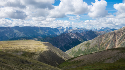 Fototapeta premium Summer Landscape of Eastern Sayan Mountains, scenic voew with cloudy sky. Russia, Siberia.