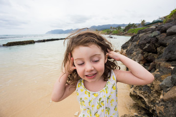 Child Playing on Beach in Oahu Hawaii