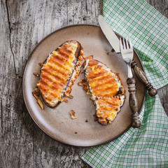 Grilled cheese sandwich, welsh rarebit, selective focus, top view