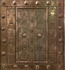 Background metal forged wall with rivets