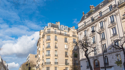 Paris, beautiful building facade in a attractive area of the capital, in the center

