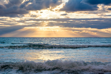 Fototapeta na wymiar Landscape Of Wave Sea At Sunset