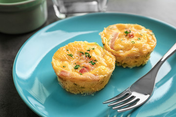 Plate with tasty egg muffins, closeup