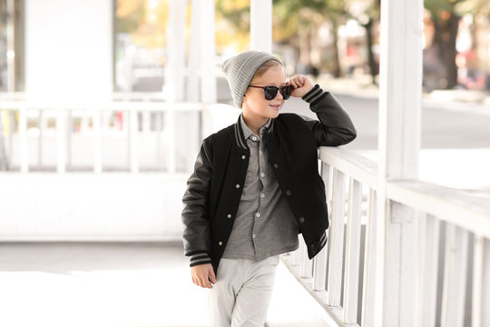 Cute fashionable boy outdoors
