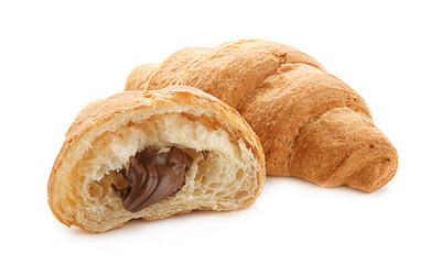 Yummy fresh croissant with chocolate on white background