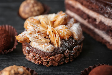 Tasty praline cake on table