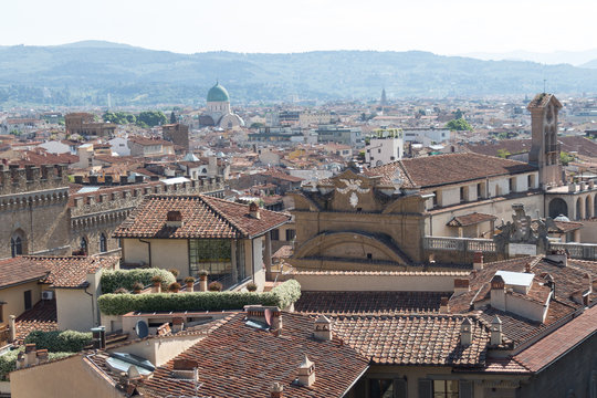 Red roofs of Florence in a sunny day, Tuscany, Italy.