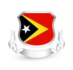 East Timor flag in shield and ribbon