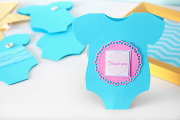 Thank you card for baby shower party on table, closeup