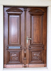 old antique brown door with a Gothic design