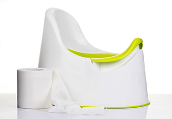 child's toilet potty with toilet paper