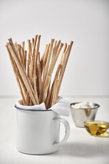 Arrangement of bread snack in mug