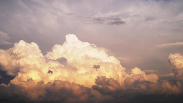 dramatic thunderclouds rising up in the stratosphere