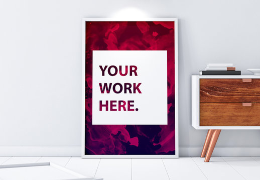 Framed Poster Mockup Leaning Against Wall with Contemporary Furniture