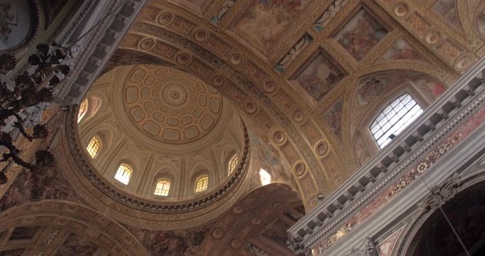 NAPLES, ITALY – JULY 2016 : Video shot of Church of Gesù Nuovo interior on a sunny day with ceiling and windows in view
