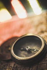 Closeup of an Old Compass on an Old Map