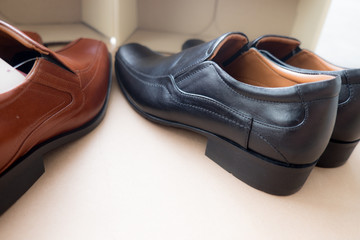 Close up black leather shoes