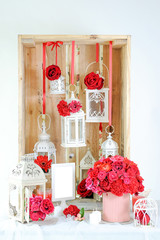 interior decor of red flower and candle