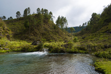 River between mountains and cloud forest, pure water, fresh air and pure in Huehuetenango, Guatemala, Central America.