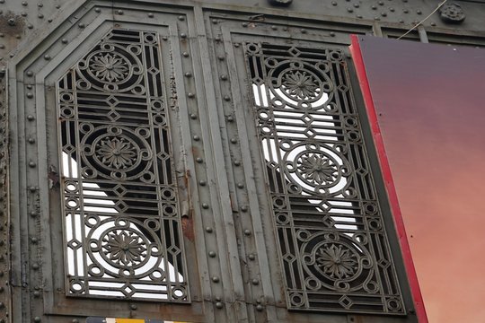 Ornate vintage ironwork on railway overpass in Dublin Ireland