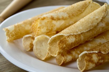 Krumkake on a white plate