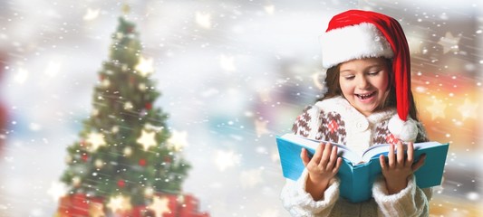 Surprised child opening book.