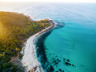 Aerial photograph over a beautiful beach in Cape Naturaliste near the towns of Dunsborough and Margaret River in the south west of Western Australia. - obrazy, fototapety, plakaty