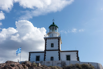 Fototapeta na wymiar Lighthouse on south coast of Santorini
