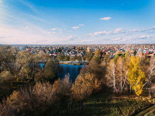 Golden red sunlight AERIAL view, Russia, River, small town, bridge