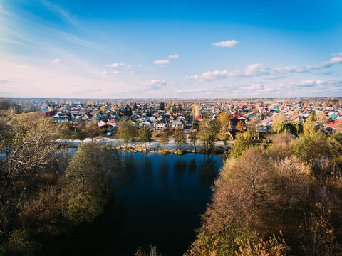 Golden red sunlight AERIAL view, Russia, River, small town, bridge