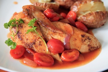 tender chicken cooked on a plate stock photo