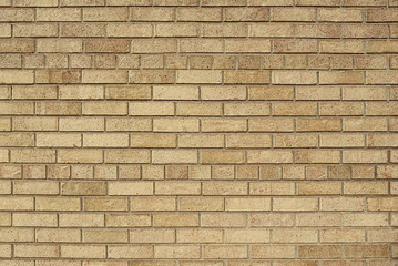 Old beige brick wall background texture