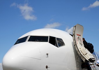 outside airplane cockpit with blue sky