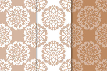 Brown floral backgrounds. Set of seamless patterns