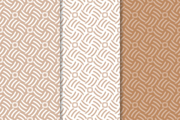 Brown and white geometric ornaments. Set of seamless patterns