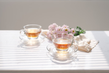 Cup of tea on the windowsill. Tea time.