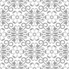 Fototapeta premium Gray floral ornament on white background. Seamless pattern