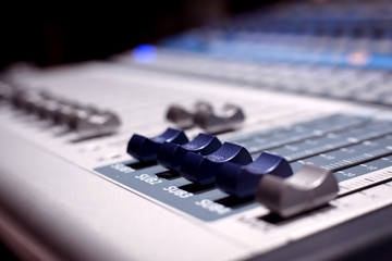 Buttons equipment for sound mixer control selective focus. Sound mixer controller. Closeup view.Professional studio equipment for sound mixing. Sound equalizer.