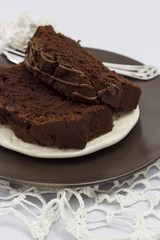 Two Pieces of Chocolate Banana Cake on plate. Soft toned. Selective focus