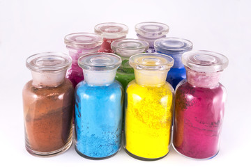 glass containers containing natural colored pigments in powder