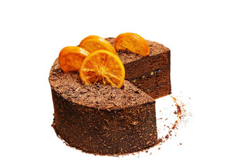 Chocolate cake decorated with caramelized orange slices. Isolated on white.