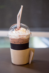Cup of ice chocolate with whipped cream