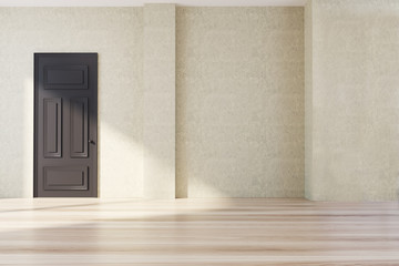 Empty concrete room with a door