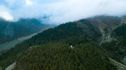 Naklejka premium Stupa in Himalayas range Nepal from Air view from drone