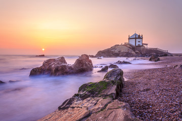 Church Lord of the Stone in Porto, Portugal by sunset