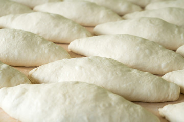 Fresh dough on the wooden board, pizza, Georgian bread