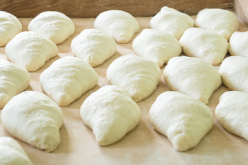 Fresh dough on the wooden board, pizza, Georgian bread