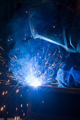 Fototapeta na wymiar welder uses torch